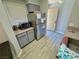 Efficient kitchen corner featuring stainless steel appliances and tile flooring at 2016 Mesquite Ln # 302, Laughlin, NV 89029