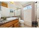 Staged bathroom features granite-look counter, integrated sink, and shower-tub combination at 2020 S Omaha Ave, Pahrump, NV 89048