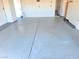 Spacious garage with sealed concrete flooring and built in cabinets at 2020 S Omaha Ave, Pahrump, NV 89048