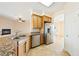 Spacious kitchen with a large island, granite countertops, stainless steel appliances, and tile flooring at 2020 S Omaha Ave, Pahrump, NV 89048