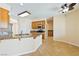 Functional kitchen featuring ample counter space, oak cabinets, stainless steel appliances, and a breakfast bar at 2020 S Omaha Ave, Pahrump, NV 89048