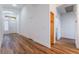 Welcoming entry with hardwood flooring, a coat closet, and neutral color scheme for a spacious feel at 203 Sea Rim Ave, Las Vegas, NV 89148