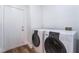 Laundry room with washer and dryer hookups and an exterior door at 203 Sea Rim Ave, Las Vegas, NV 89148
