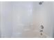 Clean shower over tub features tile surround and built-in soap holder at 203 Sea Rim Ave, Las Vegas, NV 89148