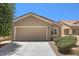 Charming single-story home featuring a well-maintained front yard and a two-car garage at 2117 Bay Thrush Way, North Las Vegas, NV 89084