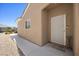Inviting entryway showcasing a stylish front door with a security screen and covered porch at 2117 Bay Thrush Way, North Las Vegas, NV 89084
