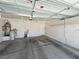 Garage interior with ample room for parking and storage plus overhead storage racks at 2117 Bay Thrush Way, North Las Vegas, NV 89084
