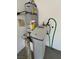 Water softener and water heater in garage with cement floor at 2117 Bay Thrush Way, North Las Vegas, NV 89084