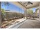 Relaxing covered patio area offering shade and privacy with a view of the backyard at 2117 Bay Thrush Way, North Las Vegas, NV 89084