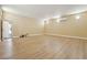 Spacious basement with modern floors, recessed lights, a ductless A/C, and an exit door at 2181 E Winery Rd, Pahrump, NV 89048