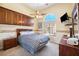Cozy bedroom features vaulted ceiling, carpet and backyard view at 2181 E Winery Rd, Pahrump, NV 89048