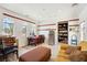 Bright bonus room with tile floors, abundant storage, and large windows providing ample light at 2181 E Winery Rd, Pahrump, NV 89048
