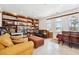 Spacious bonus room with tile flooring, built-in shelving, lots of storage, and natural light at 2181 E Winery Rd, Pahrump, NV 89048