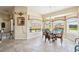 Bright breakfast nook with backyard views and access to the outdoor space at 2181 E Winery Rd, Pahrump, NV 89048