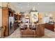 Well-equipped kitchen featuring granite countertops, stainless steel appliances, and breakfast bar seating at 2181 E Winery Rd, Pahrump, NV 89048