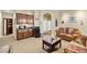 Spacious living room features a coffee bar and comfortable seating arrangement for relaxation and socializing at 2181 E Winery Rd, Pahrump, NV 89048