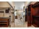 Elegant bath/closet space with mirrors, closet organizers, and tiled floors at 2181 E Winery Rd, Pahrump, NV 89048