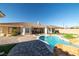 Tranquil backyard featuring a sparkling pool, perfect for relaxation and outdoor enjoyment at 2181 E Winery Rd, Pahrump, NV 89048