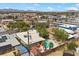An aerial view showcases a home with a private pool and mature landscaping in a vibrant neighborhood at 2408 Berkley Ave, Las Vegas, NV 89101