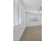 Bright bedroom features a modern ceiling fan, neutral paint and plush carpeting at 2408 Berkley Ave, Las Vegas, NV 89101