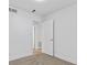 Empty bedroom featuring plush carpet, white trim, and natural light at 2408 Berkley Ave, Las Vegas, NV 89101