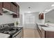 Modern kitchen features stainless steel appliances, shaker cabinets, and light countertops at 2408 Berkley Ave, Las Vegas, NV 89101