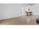 Open-concept living space with bar seating, tile floors, and bright lighting at 2408 Berkley Ave, Las Vegas, NV 89101