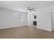 Bright living room with wood-look tile floors flows into adjacent kitchen at 2408 Berkley Ave, Las Vegas, NV 89101