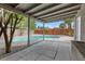 Covered patio overlooking a sparkling in-ground pool, ideal for outdoor entertaining at 2408 Berkley Ave, Las Vegas, NV 89101
