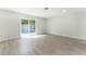 Bright, open bedroom with light wood floors and large sliding glass doors to the pool area at 3409 El Cortez Ave, Las Vegas, NV 89102