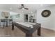 Spacious game room with a pool table, bar stools, and décor, perfect for entertaining guests at 3409 El Cortez Ave, Las Vegas, NV 89102