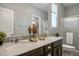 Bathroom featuring double sinks, spacious vanity, and a shower at 3484 Bradano Ln, Henderson, NV 89044
