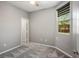 Carpeted bedroom features a window with a modern shade at 3484 Bradano Ln, Henderson, NV 89044