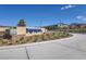 Attractive community entrance sign surrounded by lush greenery, setting a welcoming tone at 3484 Bradano Ln, Henderson, NV 89044