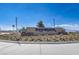 Inviting community entrance sign with manicured landscaping, welcoming residents and visitors at 3484 Bradano Ln, Henderson, NV 89044