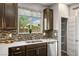 Bright kitchen with stainless steel appliances and decorative backsplash at 3484 Bradano Ln, Henderson, NV 89044