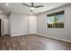 Open living area features hardwood floors and a large window at 3484 Bradano Ln, Henderson, NV 89044