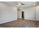 Spacious living area with hardwood flooring and neutral paint tones at 3484 Bradano Ln, Henderson, NV 89044