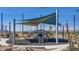 Community playground with shaded play structures and climbing frames for enjoyment at 3484 Bradano Ln, Henderson, NV 89044