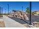 Community area with a rock climbing feature for outdoor activity and recreation at 3484 Bradano Ln, Henderson, NV 89044