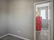Neutral walk-in closet with gray carpet, storage rack, and space for organizing clothes at 3484 Bradano Ln, Henderson, NV 89044