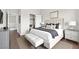 Staged bedroom with a king bed, neutral decor, and ample natural light at 367 Wilford Springs St, Henderson, NV 89014