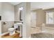 Half-bathroom with pedestal sink and tile accents, located off the main room at 3717 Shanagolden St, Las Vegas, NV 89129