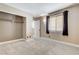 Bedroom with natural light, closet, carpet, and door, ready to personalize at 3717 Shanagolden St, Las Vegas, NV 89129