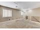 Carpeted bonus room with plenty of natural light and neutral paint scheme at 3717 Shanagolden St, Las Vegas, NV 89129