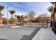 Gated community entrance with signage and well-maintained landscaping, offering security and curb appeal at 3717 Shanagolden St, Las Vegas, NV 89129