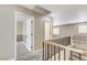 Second story hallway featuring neutral colors and access to other rooms at 3717 Shanagolden St, Las Vegas, NV 89129