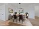 Elegant dining room with modern light fixture and stylish décor at 383 Virginia Lake Ave, Henderson, NV 89015