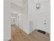 Welcoming entryway showcasing wood-look floors and modern light fixtures at 383 Virginia Lake Ave, Henderson, NV 89015