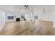 Open-concept living space with lots of natural light, fireplace, and wood flooring at 383 Virginia Lake Ave, Henderson, NV 89015